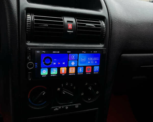 Черный Опель Астра, объемом двигателя 2 л и пробегом 300 тыс. км за 3800 $, фото 8 на Automoto.ua