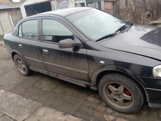 Черный Опель Астра, объемом двигателя 1.4 л и пробегом 280 тыс. км за 3700 $, фото 3 на Automoto.ua