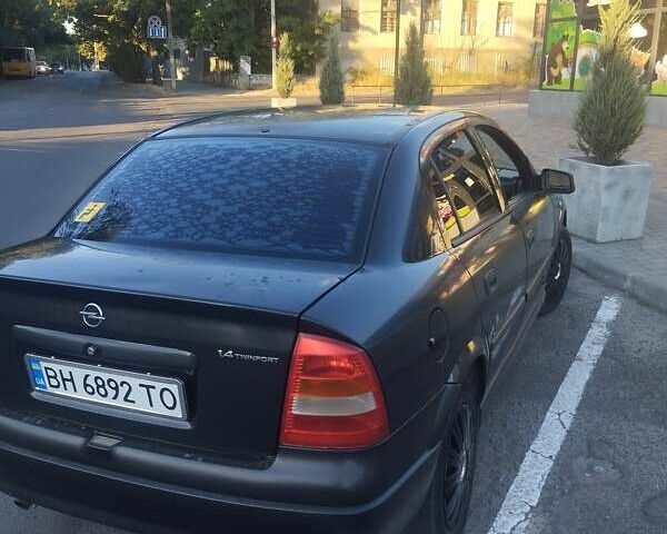Черный Опель Астра, объемом двигателя 1.36 л и пробегом 330 тыс. км за 3600 $, фото 9 на Automoto.ua