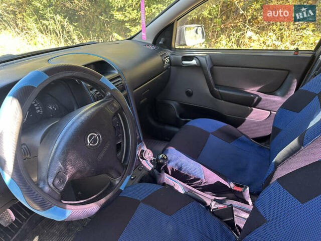 Черный Опель Астра, объемом двигателя 1.4 л и пробегом 230 тыс. км за 2100 $, фото 6 на Automoto.ua