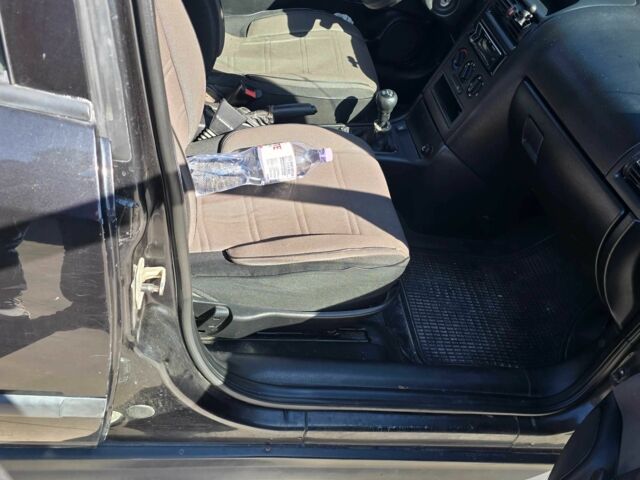 Черный Опель Астра, объемом двигателя 1.4 л и пробегом 240 тыс. км за 3000 $, фото 4 на Automoto.ua