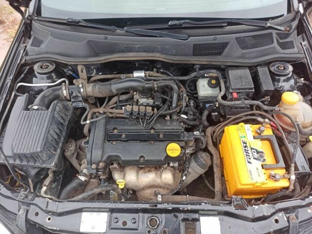 Черный Опель Астра, объемом двигателя 1.4 л и пробегом 282 тыс. км за 2000 $, фото 14 на Automoto.ua