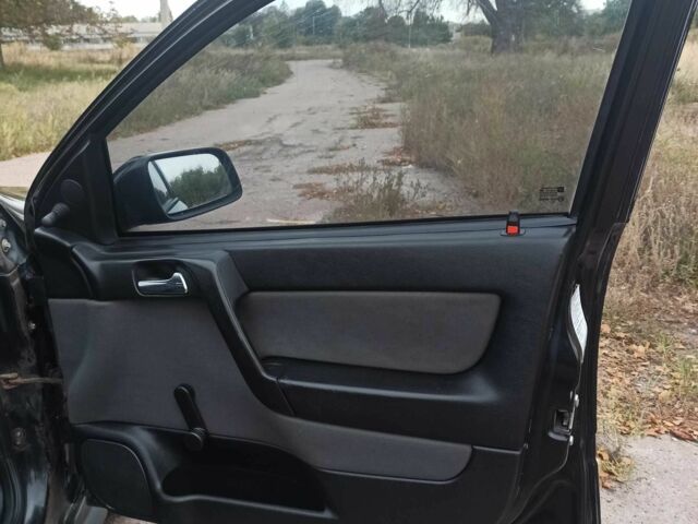 Черный Опель Астра, объемом двигателя 1.4 л и пробегом 282 тыс. км за 2000 $, фото 13 на Automoto.ua