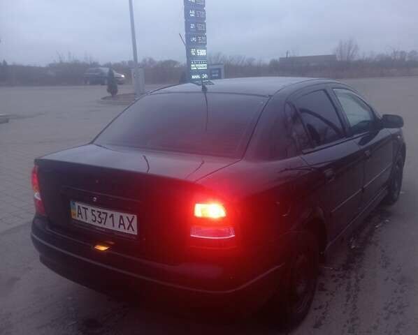 Чорний Опель Астра, об'ємом двигуна 1.39 л та пробігом 215 тис. км за 2999 $, фото 6 на Automoto.ua