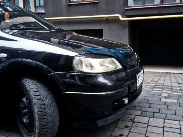 Черный Опель Астра, объемом двигателя 1.4 л и пробегом 214 тыс. км за 1800 $, фото 15 на Automoto.ua