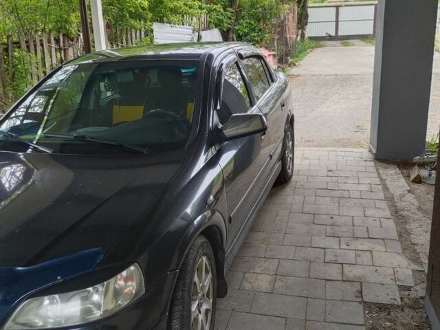 Черный Опель Астра, объемом двигателя 0 л и пробегом 247 тыс. км за 3700 $, фото 1 на Automoto.ua