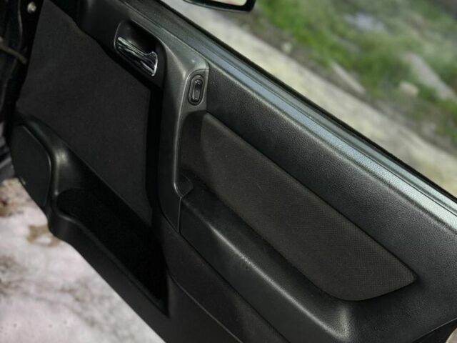 Черный Опель Астра, объемом двигателя 1.4 л и пробегом 215 тыс. км за 3500 $, фото 15 на Automoto.ua