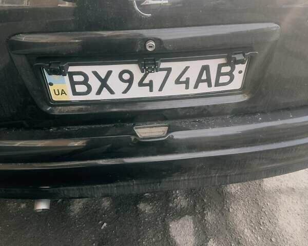 Черный Опель Астра, объемом двигателя 1.39 л и пробегом 280 тыс. км за 3300 $, фото 31 на Automoto.ua