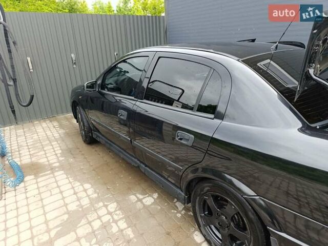 Черный Опель Астра, объемом двигателя 1.6 л и пробегом 147 тыс. км за 2700 $, фото 8 на Automoto.ua