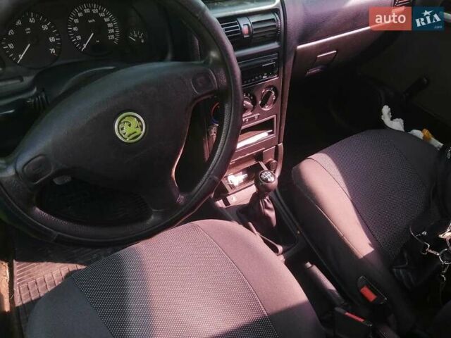 Черный Опель Астра, объемом двигателя 1.4 л и пробегом 250 тыс. км за 3000 $, фото 5 на Automoto.ua