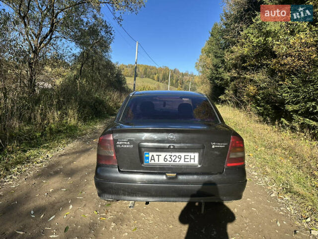 Черный Опель Астра, объемом двигателя 1.4 л и пробегом 230 тыс. км за 2100 $, фото 3 на Automoto.ua