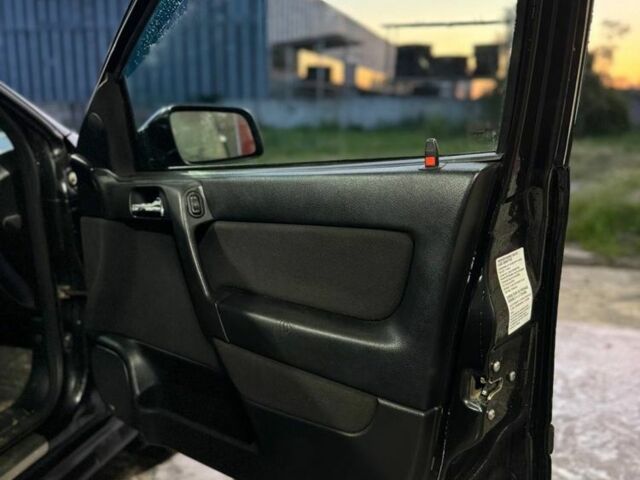 Черный Опель Астра, объемом двигателя 1.4 л и пробегом 215 тыс. км за 3500 $, фото 14 на Automoto.ua