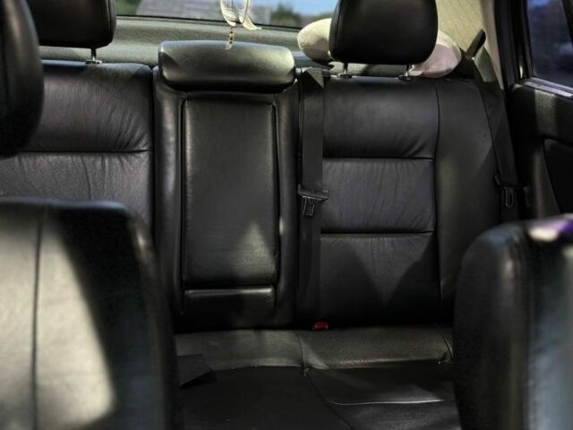 Черный Опель Астра, объемом двигателя 1.4 л и пробегом 215 тыс. км за 3500 $, фото 7 на Automoto.ua