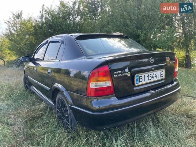 Чорний Опель Астра, об'ємом двигуна 1.4 л та пробігом 294 тис. км за 3800 $, фото 1 на Automoto.ua
