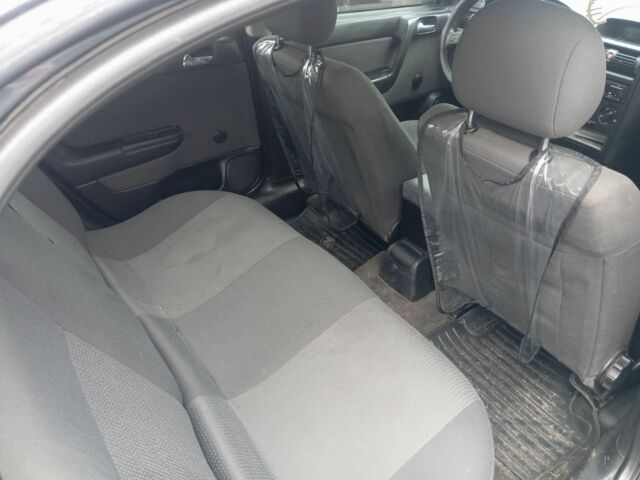 Черный Опель Астра, объемом двигателя 1.4 л и пробегом 280 тыс. км за 3700 $, фото 1 на Automoto.ua