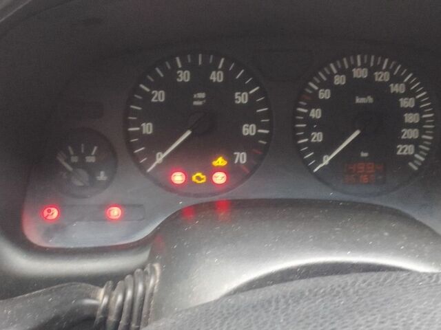 Черный Опель Астра, объемом двигателя 1.4 л и пробегом 351 тыс. км за 3333 $, фото 3 на Automoto.ua