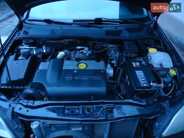 Черный Опель Астра, объемом двигателя 2 л и пробегом 300 тыс. км за 3500 $, фото 5 на Automoto.ua