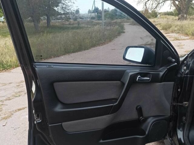 Черный Опель Астра, объемом двигателя 1.4 л и пробегом 282 тыс. км за 2000 $, фото 6 на Automoto.ua