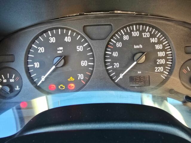 Черный Опель Астра, объемом двигателя 1.4 л и пробегом 240 тыс. км за 3000 $, фото 5 на Automoto.ua