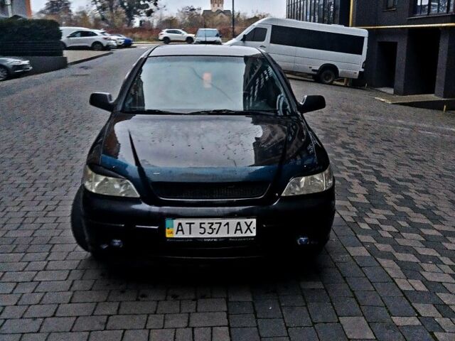 Черный Опель Астра, объемом двигателя 1.4 л и пробегом 214 тыс. км за 1800 $, фото 13 на Automoto.ua