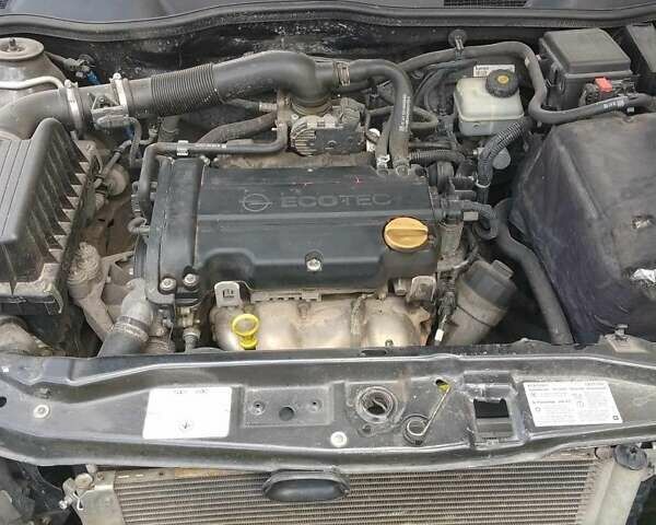 Черный Опель Астра, объемом двигателя 1.4 л и пробегом 243 тыс. км за 3200 $, фото 7 на Automoto.ua