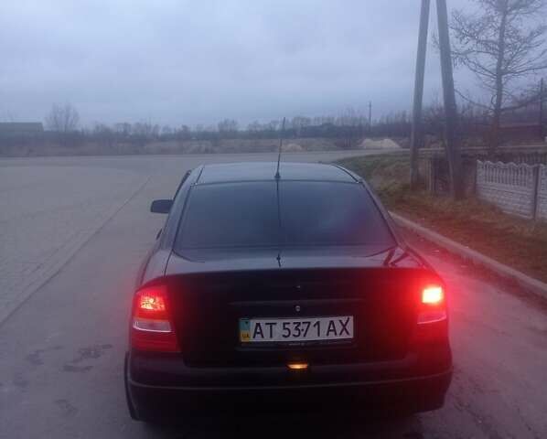 Чорний Опель Астра, об'ємом двигуна 1.39 л та пробігом 215 тис. км за 2999 $, фото 9 на Automoto.ua