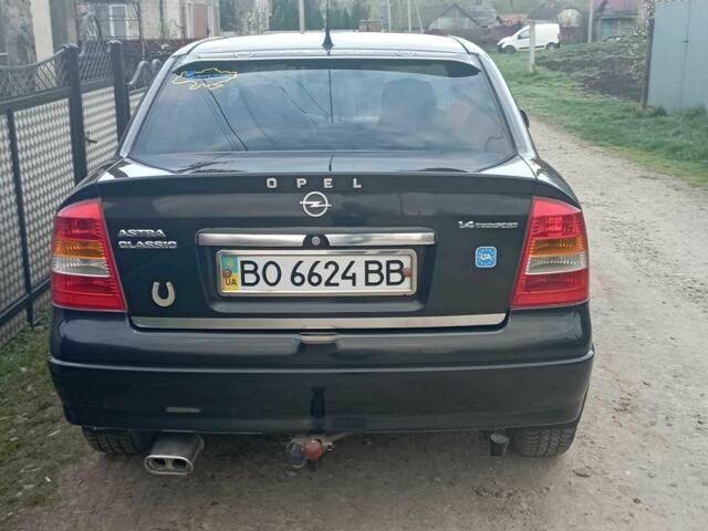 Черный Опель Астра, объемом двигателя 1.4 л и пробегом 192 тыс. км за 4100 $, фото 2 на Automoto.ua