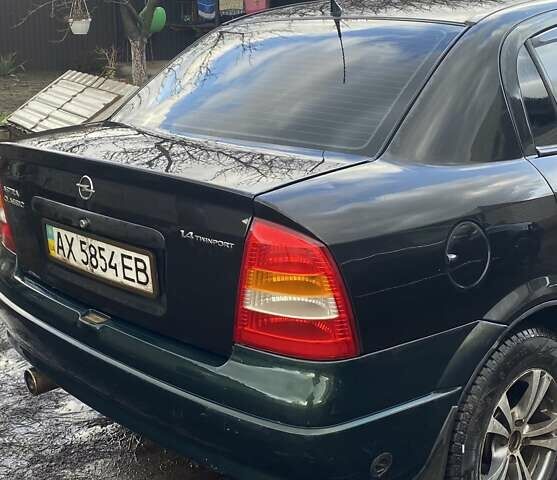 Черный Опель Астра, объемом двигателя 1.4 л и пробегом 380 тыс. км за 3200 $, фото 2 на Automoto.ua