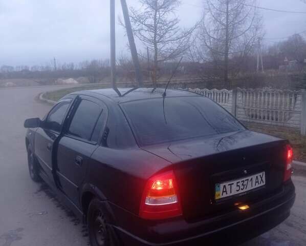 Чорний Опель Астра, об'ємом двигуна 1.39 л та пробігом 215 тис. км за 2999 $, фото 8 на Automoto.ua