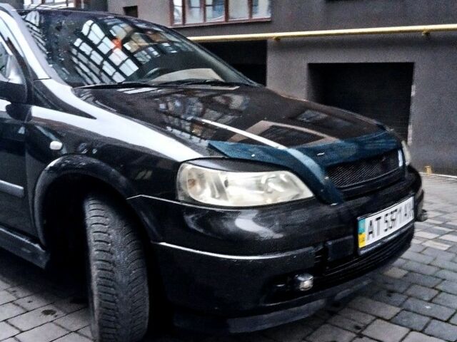 Черный Опель Астра, объемом двигателя 1.4 л и пробегом 214 тыс. км за 1800 $, фото 16 на Automoto.ua