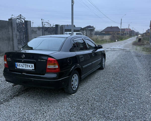 Черный Опель Астра, объемом двигателя 1.36 л и пробегом 260 тыс. км за 2900 $, фото 4 на Automoto.ua
