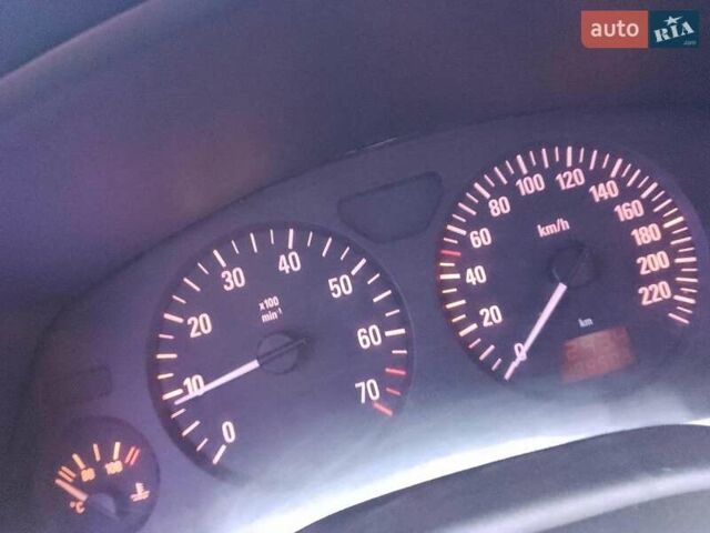 Черный Опель Астра, объемом двигателя 1.4 л и пробегом 243 тыс. км за 3200 $, фото 9 на Automoto.ua