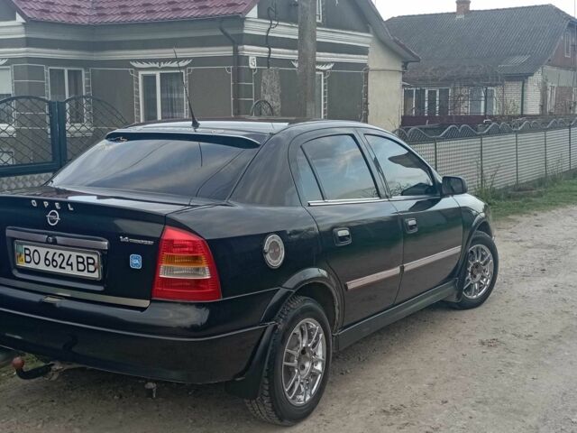 Черный Опель Астра, объемом двигателя 1.4 л и пробегом 192 тыс. км за 4100 $, фото 1 на Automoto.ua