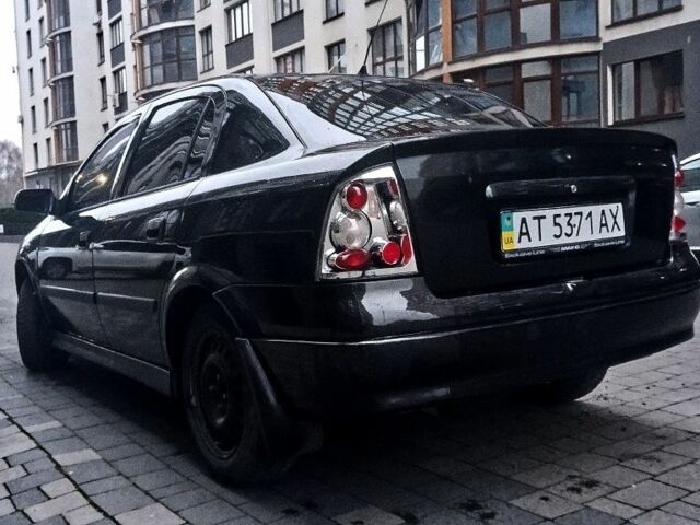 Черный Опель Астра, объемом двигателя 1.4 л и пробегом 214 тыс. км за 1800 $, фото 19 на Automoto.ua