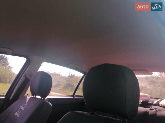 Черный Опель Астра, объемом двигателя 1.4 л и пробегом 250 тыс. км за 3000 $, фото 1 на Automoto.ua