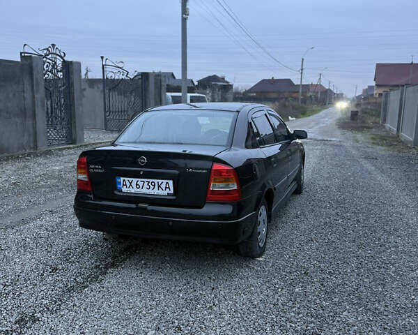 Черный Опель Астра, объемом двигателя 1.36 л и пробегом 260 тыс. км за 2900 $, фото 7 на Automoto.ua