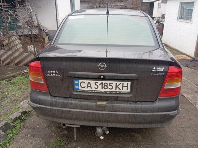 Черный Опель Астра, объемом двигателя 1.4 л и пробегом 280 тыс. км за 3700 $, фото 4 на Automoto.ua