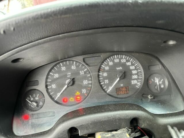 Черный Опель Астра, объемом двигателя 1.4 л и пробегом 208 тыс. км за 2849 $, фото 4 на Automoto.ua