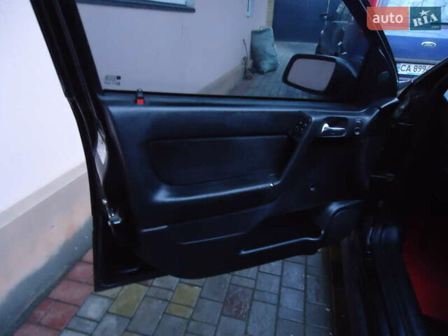 Черный Опель Астра, объемом двигателя 2 л и пробегом 300 тыс. км за 3500 $, фото 8 на Automoto.ua