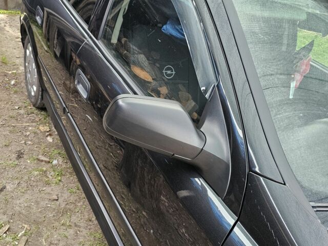 Черный Опель Астра, объемом двигателя 0 л и пробегом 217 тыс. км за 4000 $, фото 7 на Automoto.ua