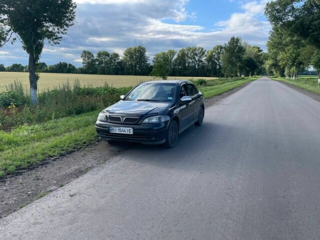 Черный Опель Астра, объемом двигателя 1.4 л и пробегом 294 тыс. км за 3800 $, фото 5 на Automoto.ua