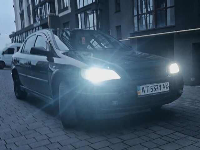 Черный Опель Астра, объемом двигателя 1.4 л и пробегом 214 тыс. км за 1800 $, фото 1 на Automoto.ua