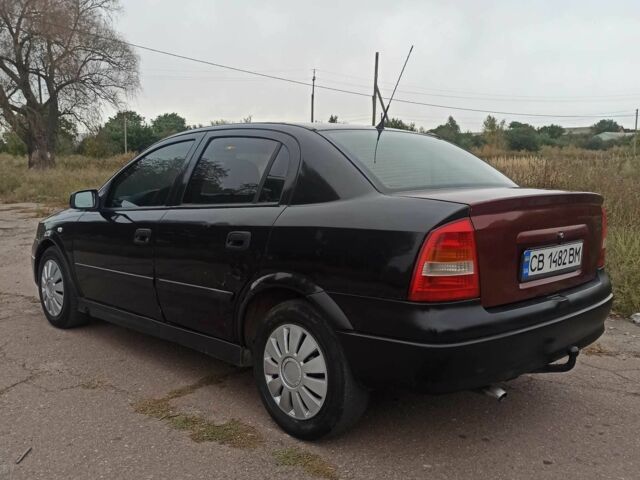 Черный Опель Астра, объемом двигателя 1.4 л и пробегом 282 тыс. км за 2000 $, фото 2 на Automoto.ua