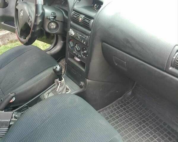 Черный Опель Астра, объемом двигателя 1.4 л и пробегом 243 тыс. км за 3200 $, фото 2 на Automoto.ua