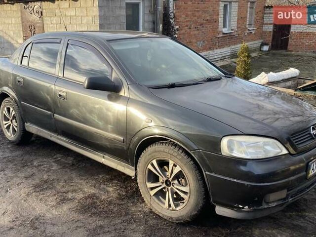 Черный Опель Астра, объемом двигателя 1.4 л и пробегом 380 тыс. км за 3200 $, фото 10 на Automoto.ua
