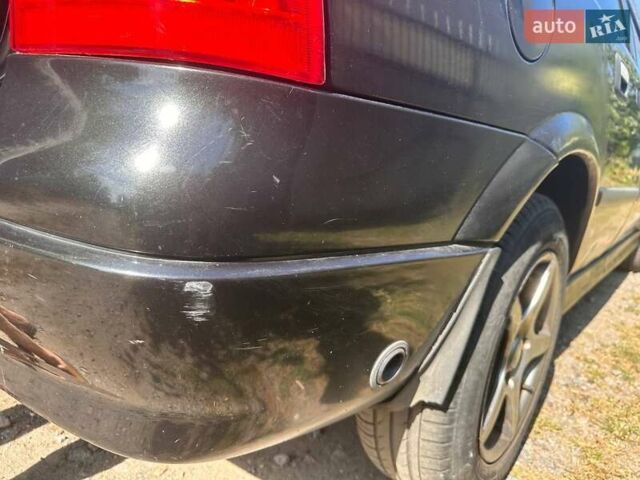 Черный Опель Астра, объемом двигателя 1.4 л и пробегом 310 тыс. км за 3100 $, фото 1 на Automoto.ua