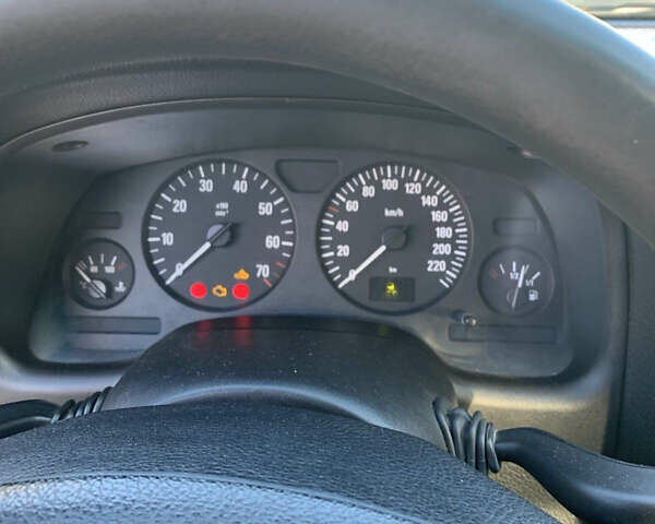 Черный Опель Астра, объемом двигателя 1.4 л и пробегом 216 тыс. км за 3500 $, фото 8 на Automoto.ua