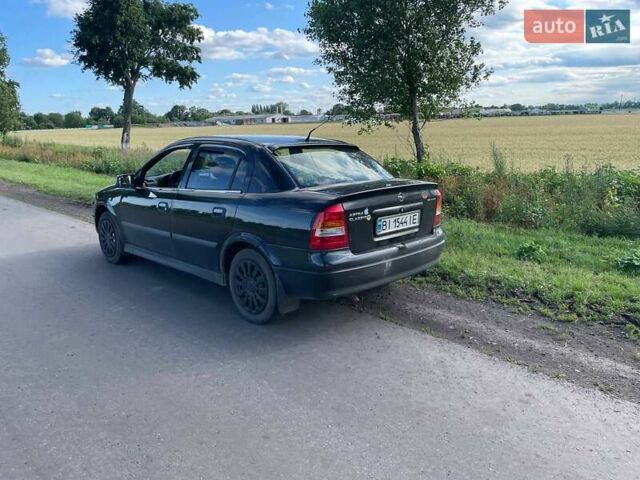 Чорний Опель Астра, об'ємом двигуна 1.4 л та пробігом 294 тис. км за 3800 $, фото 2 на Automoto.ua