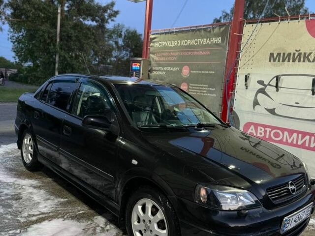 Черный Опель Астра, объемом двигателя 1.4 л и пробегом 215 тыс. км за 3500 $, фото 2 на Automoto.ua