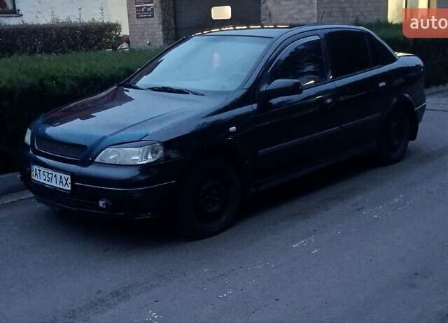 Черный Опель Астра, объемом двигателя 1.39 л и пробегом 214 тыс. км за 1800 $, фото 9 на Automoto.ua